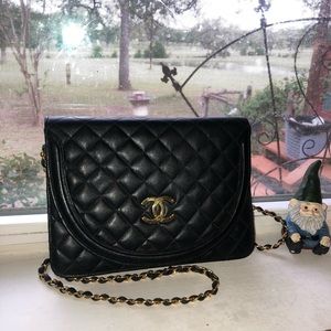 black and gold, leather, crossbody chanel bag